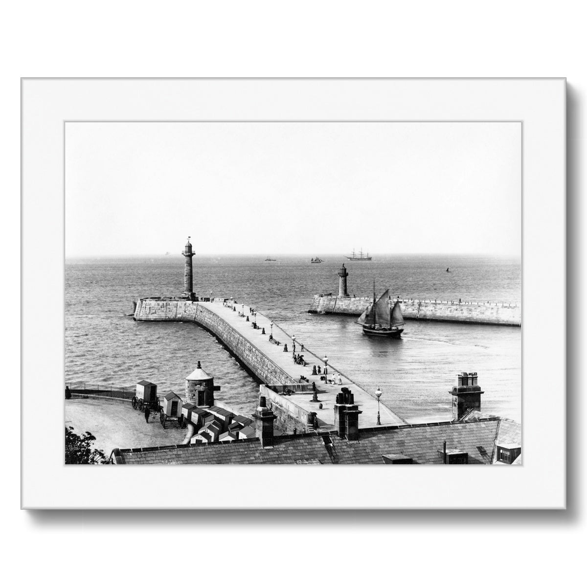 Whitby piers pre-extensions with outgoing sailing ships Framed Print